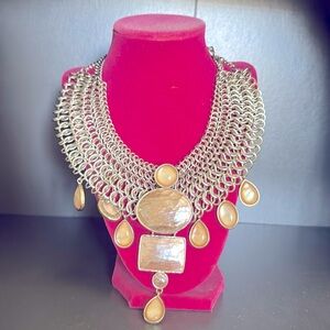 Pink hues and silver statement necklace